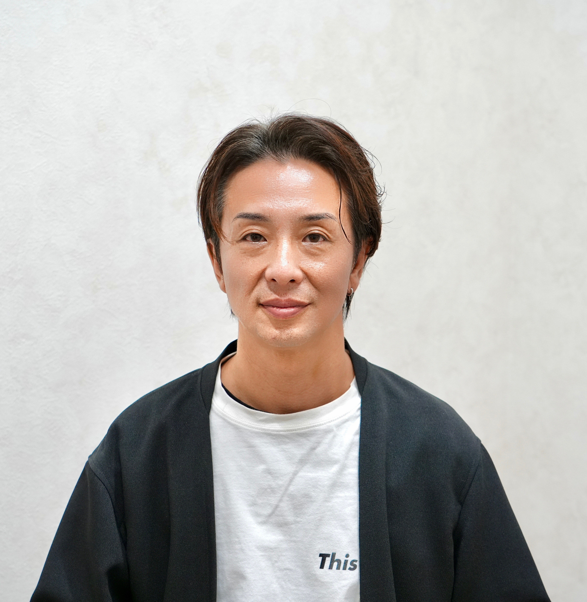 Director 齋藤 友貴彦